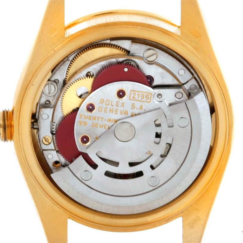 The image shows the inner mechanical movement of a Rolex President 69268 Women's Yellow Gold Champagne Dial 69268 Women's Yellow Gold Champagne Dial model watch from a direct angle.