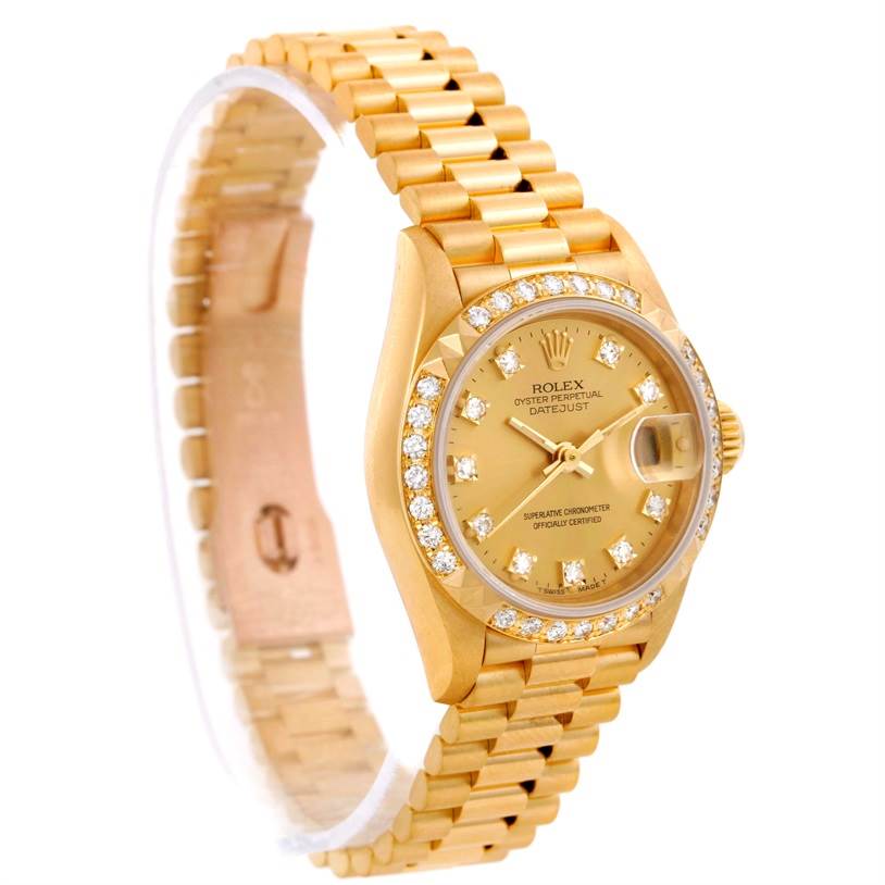 The Rolex President 69268 Women's Yellow Gold Champagne Dial 69268 Women's Yellow Gold Champagne Dial model watch is shown at a three-quarter angle, highlighting the gold band, diamond bezel, and date window.
