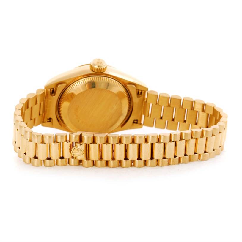 This image shows the back view and bracelet of a Rolex President 69178 Women's Yellow Gold Champagne Dial 69178 Women's Yellow Gold Champagne Dial model watch.