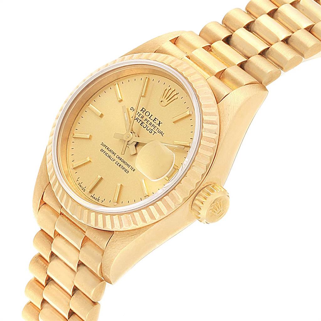 The image shows a Rolex President 69178 Women
s Yellow Gold Champagne Dial 69178 Women
s Yellow Gold Champagne Dial watch from a slight angle, featuring its dial, bezel, case, and partial bracelet.