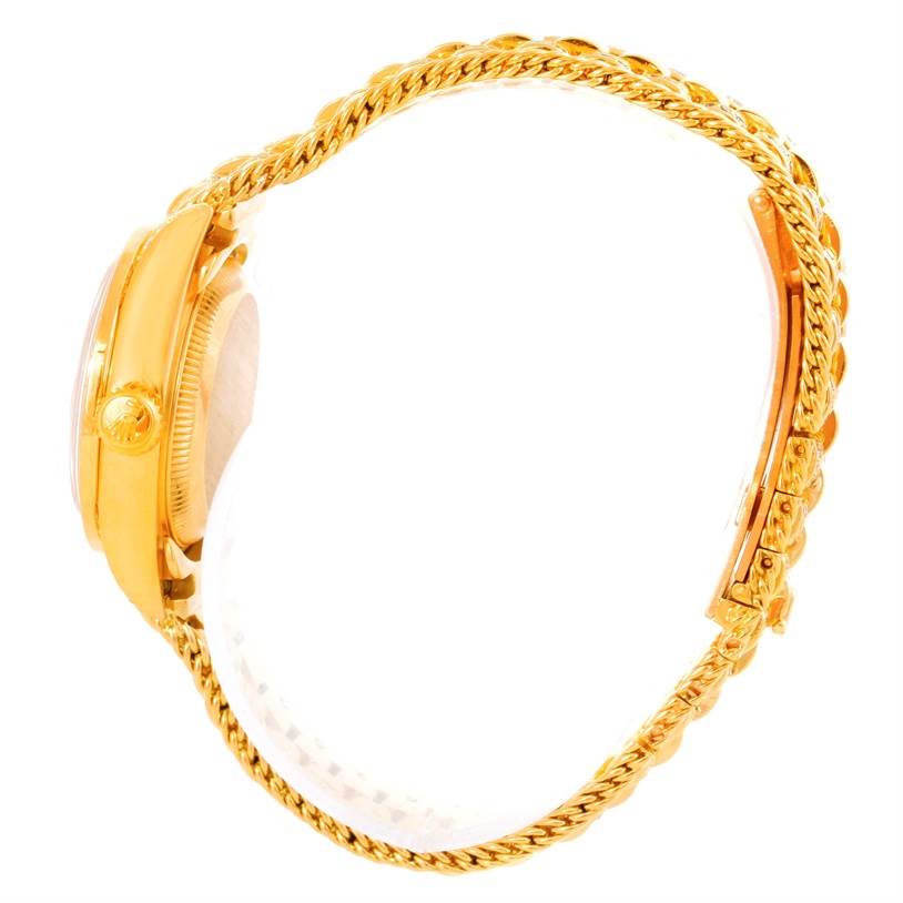 This image shows a side profile view of a Rolex President 69238 Women's Yellow Gold Champagne Dial 69238 Women's Yellow Gold Champagne Dial model watch, highlighting its gold case, crown, and bracelet.