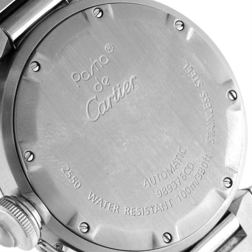 The image shows the back case of a Pasha de Cartier watch, highlighting the inscriptions and screws.
