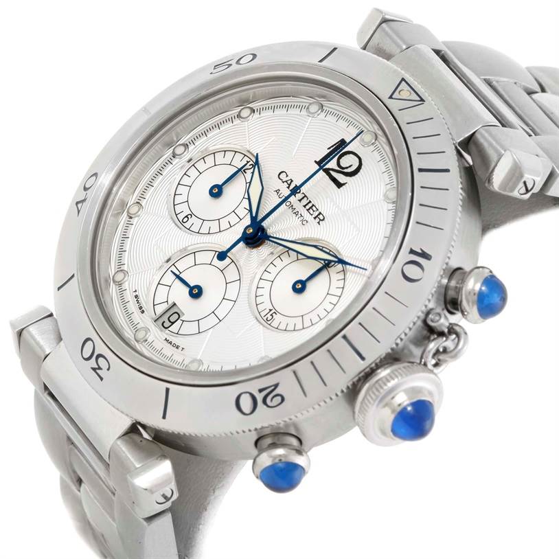 The Cartier Pasha W31030H3 Men
s Stainless Steel Silver Dial W31030H3 Men
s Stainless Steel Silver Dial watch is shown at an angled view, highlighting the dial, subdials, bezel, bracelet, and crown with blue cabochon.