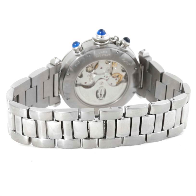 The image shows the back view of a Cartier Pasha W31030H3 Men
s Stainless Steel Silver Dial W31030H3 Men
s Stainless Steel Silver Dial watch, highlighting its metal bracelet and mechanical movement.