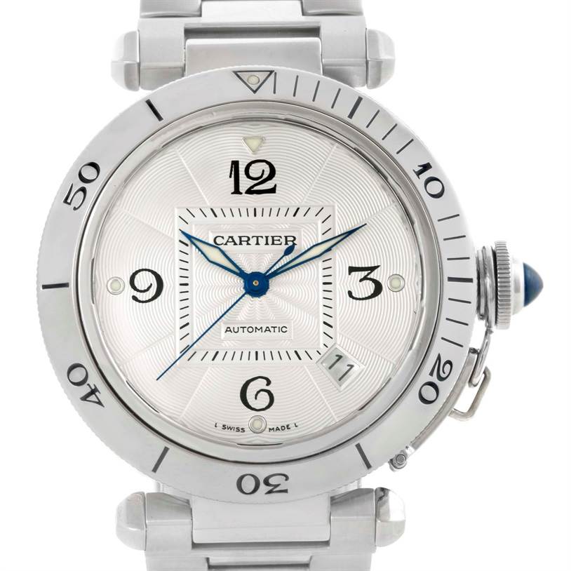 The image shows a frontal view of a Cartier Pasha W31059H3 Men
s Stainless Steel Silver Dial W31059H3 Men
s Stainless Steel Silver Dial watch, highlighting its dial, bezel, and part of its bracelet.