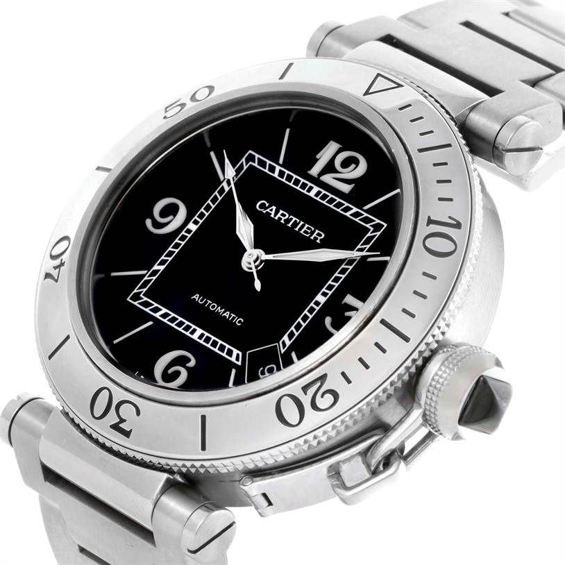 The image shows a Cartier Pasha W31077M7 Men's Stainless Steel Black Dial W31077M7 Men's Stainless Steel Black Dial watch at an oblique angle, highlighting the bezel, dial, crown, and part of the stainless steel bracelet.