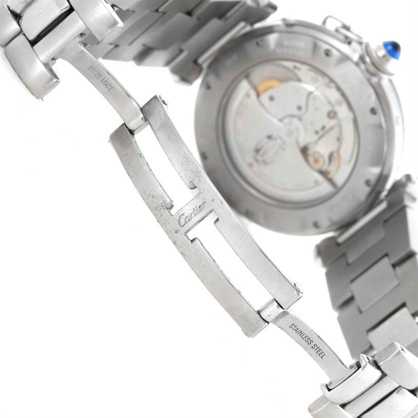 The image shows the back and clasp area of a Cartier Pasha W31037H3 Men's Stainless Steel Silver Dial W31037H3 Men's Stainless Steel Silver Dial watch, highlighting the stainless steel bracelet and mechanical movement.