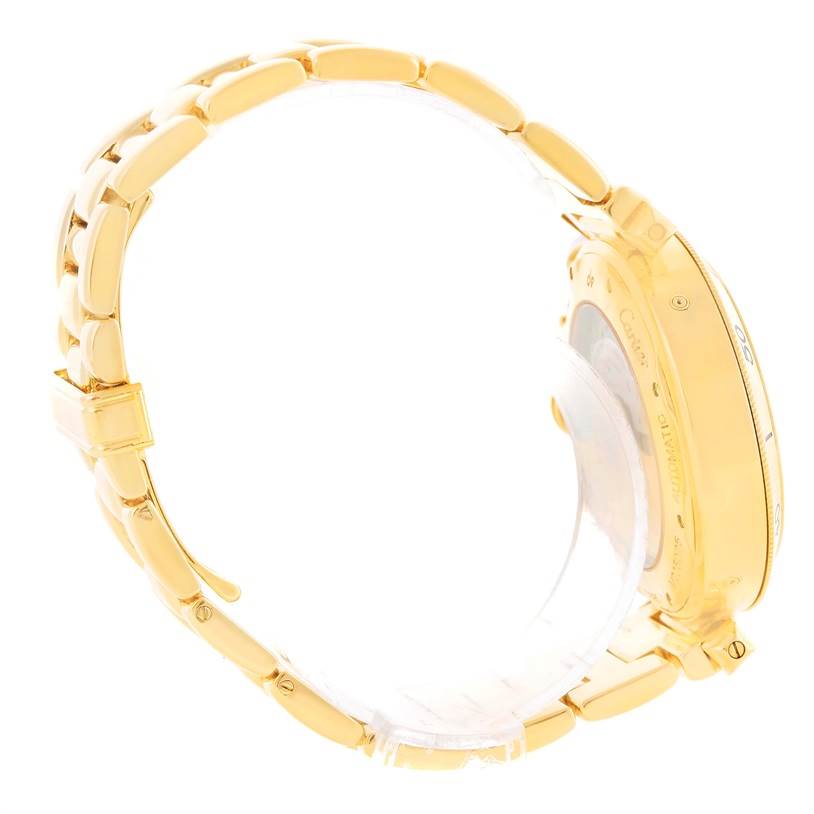 This image shows the side and back view of a Cartier Pasha M205025 Men's Yellow Gold Silver Dial M205025 Men's Yellow Gold Silver Dial model watch, highlighting its gold bracelet and case.