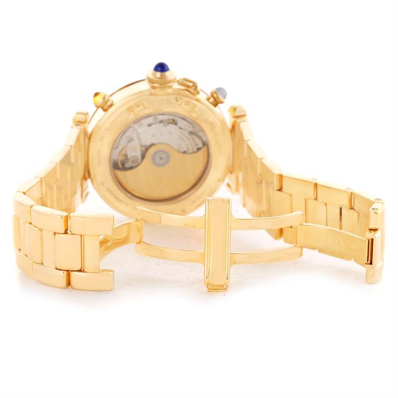 The image shows the back of a Cartier Pasha M205025 Men's Yellow Gold Silver Dial M205025 Men's Yellow Gold Silver Dial watch, highlighting the open clasp and visible movement.