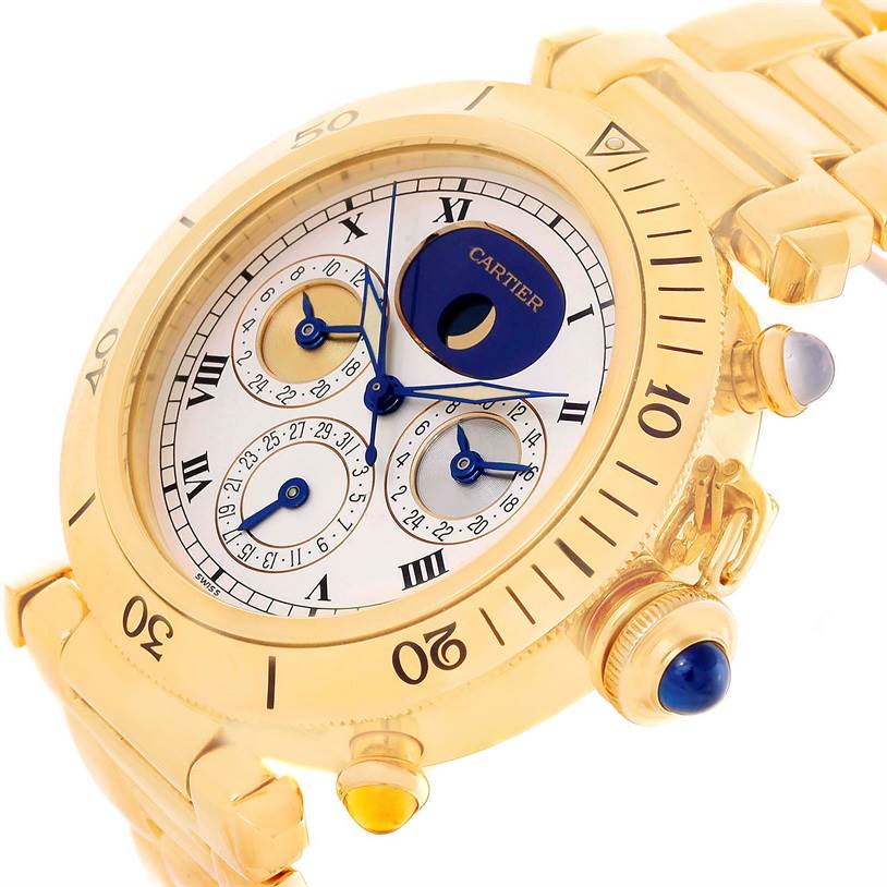 This image shows a close-up angle of the Cartier Pasha M205025 Men's Yellow Gold Silver Dial M205025 Men's Yellow Gold Silver Dial watch, highlighting its dials, bezel, and gold bracelet.