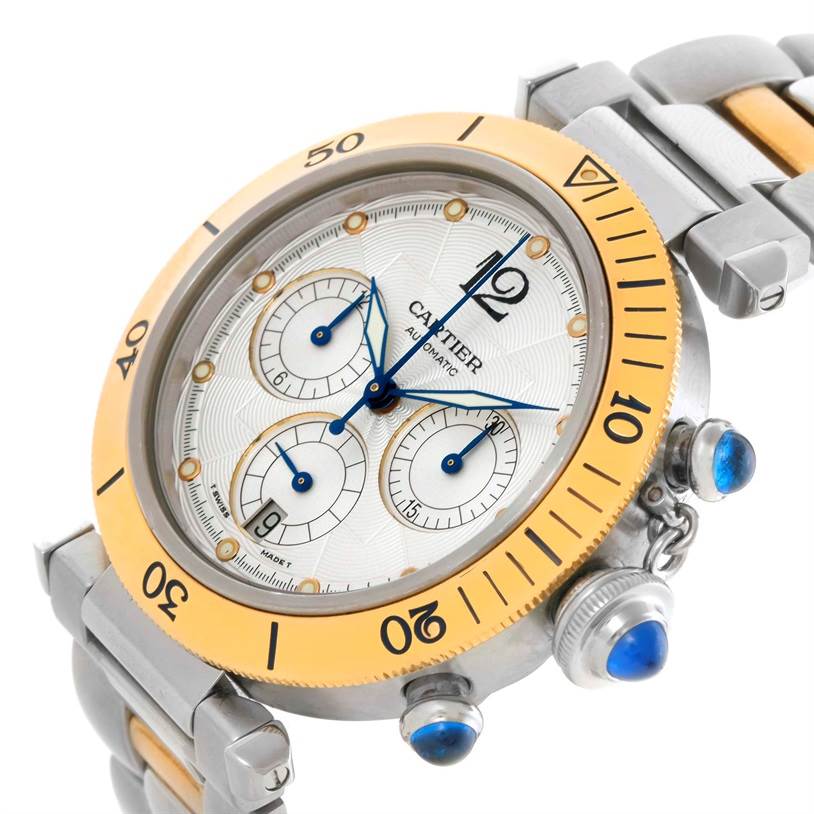 The image shows a Cartier Pasha W31036T6 Stainless Steel Silver Dial W31036T6 Stainless Steel Silver Dial watch at a three-quarter angle, highlighting the face, bezel, crown, and part of the bracelet.