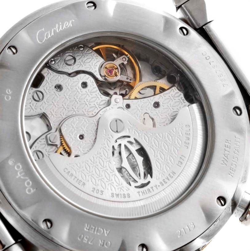 This image shows the open case back of a Cartier Pasha W31036T6 Stainless Steel Silver Dial W31036T6 Stainless Steel Silver Dial watch, revealing its inner mechanical movement.
