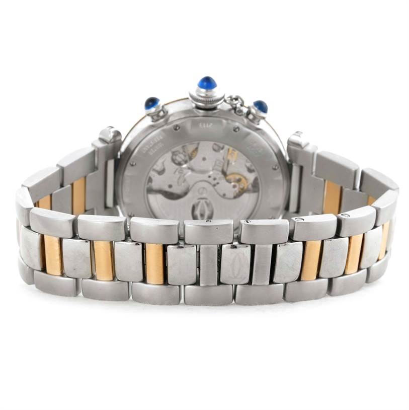 The image shows the back view of a Cartier Pasha W31036T6 Stainless Steel Silver Dial W31036T6 Stainless Steel Silver Dial watch, highlighting its case back and metal bracelet with gold accents.