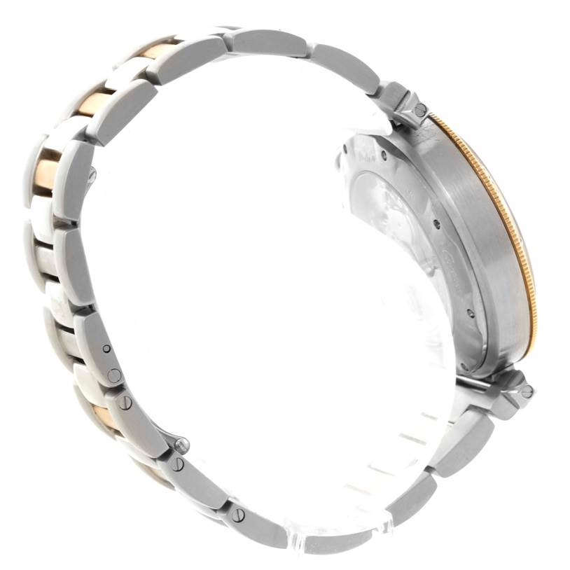 This image displays the side and partial back view of a Cartier Pasha W31036T6 Stainless Steel Silver Dial W31036T6 Stainless Steel Silver Dial watch, highlighting its two-tone bracelet and case.