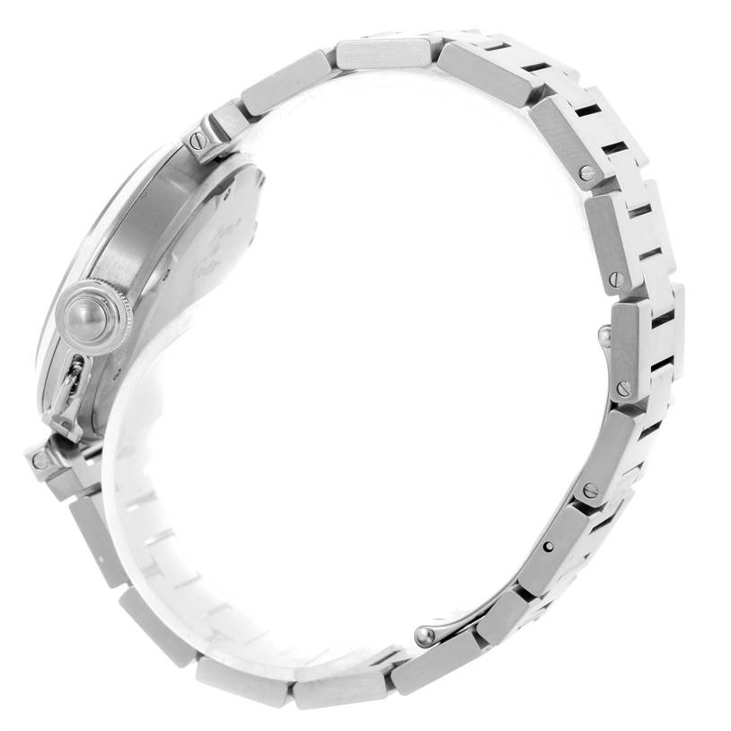 The image shows a side view of a Cartier Pasha W31055M7 Men
s Stainless Steel White Dial W31055M7 Men
s Stainless Steel White Dial watch, highlighting the case, crown, and bracelet.