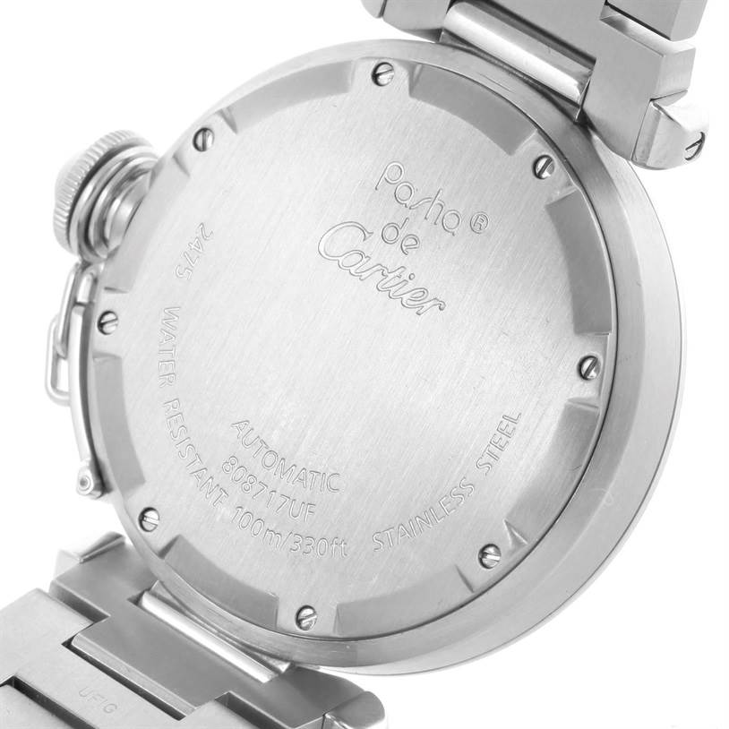The image shows the back case of a Cartier Pasha W31055M7 Men
s Stainless Steel White Dial W31055M7 Men
s Stainless Steel White Dial watch, highlighting engravings and the stainless steel material.