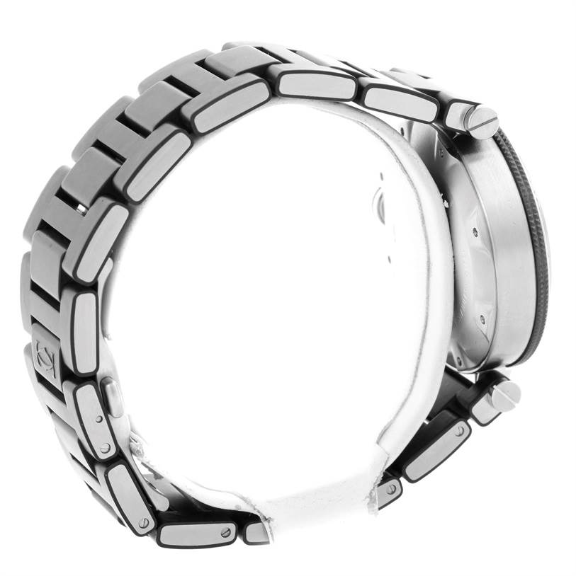 The Cartier Pasha W31077U2 Men's Stainless Steel Black Dial W31077U2 Men's Stainless Steel Black Dial watch is shown from the side, highlighting the metallic bracelet and watch case.