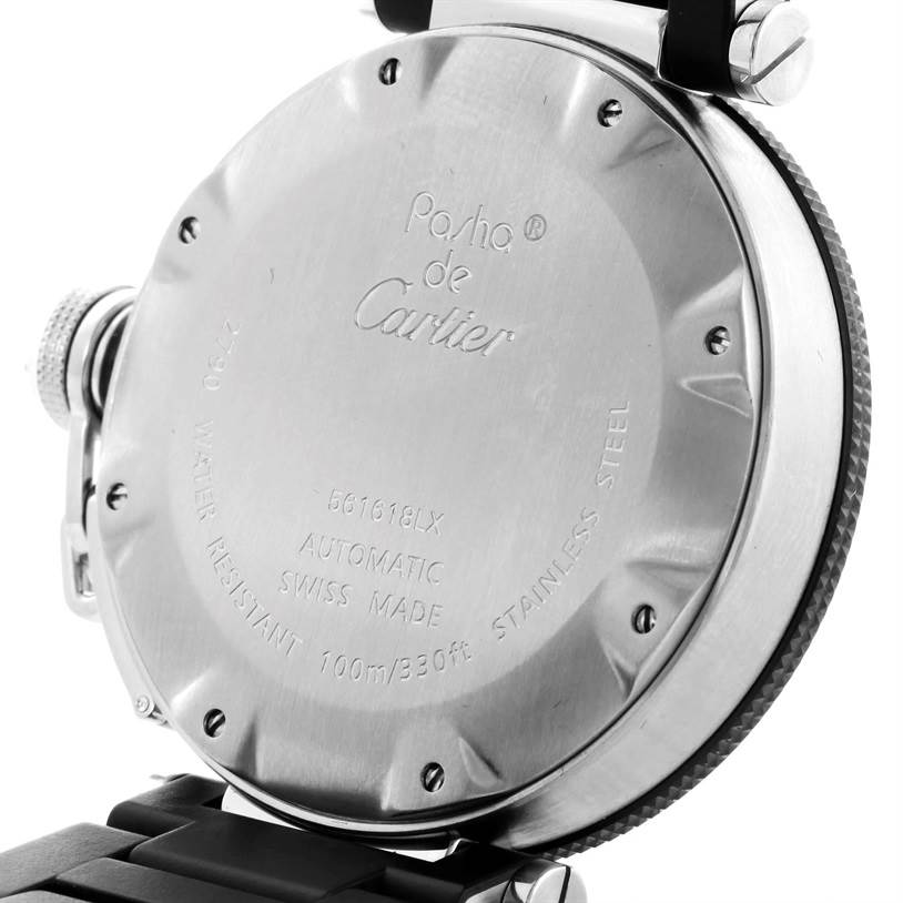 This image shows the back case of a Cartier Pasha W31077U2 Men's Stainless Steel Black Dial W31077U2 Men's Stainless Steel Black Dial watch, highlighting its inscriptions and the stainless steel material.
