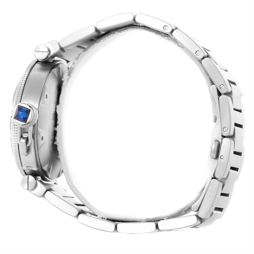 The Cartier Pasha W31080M7 Men's Stainless Steel Silver Dial W31080M7 Men's Stainless Steel Silver Dial watch is shown in a side profile, highlighting its stainless steel band and blue crown.