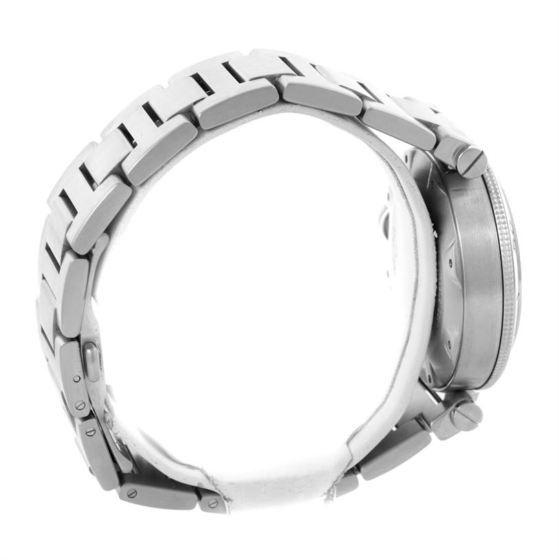 The image shows a side view of the Cartier Pasha W31080M7 Men's Stainless Steel Silver Dial W31080M7 Men's Stainless Steel Silver Dial watch, highlighting its metallic bracelet and case.