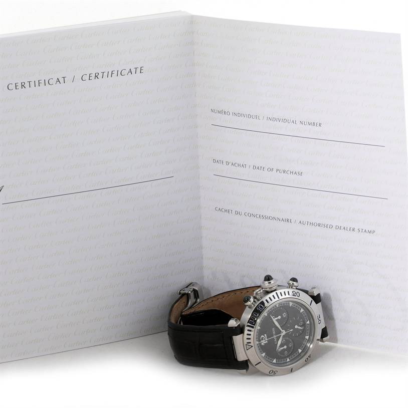The image shows a Cartier Pasha W3105155 Men's Stainless Steel Grey Dial W3105155 Men's Stainless Steel Grey Dial watch positioned at an angle, accompanied by its open certificate booklet.