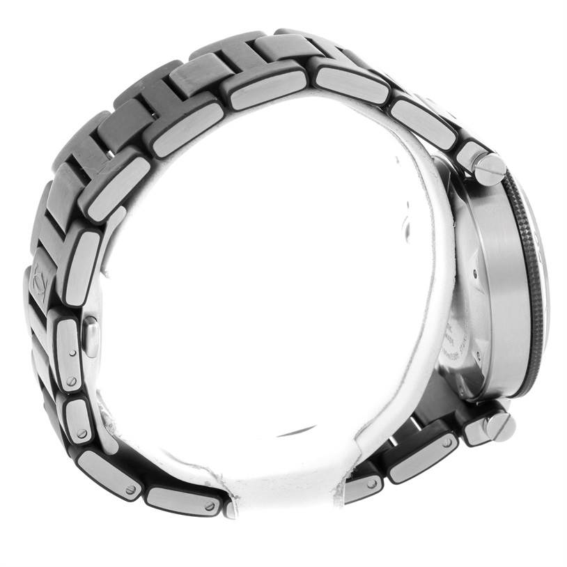 This image shows a side view of a Cartier Pasha W31077U2 Men's Stainless Steel Black Dial W31077U2 Men's Stainless Steel Black Dial watch, highlighting the metal bracelet and part of the watch case.