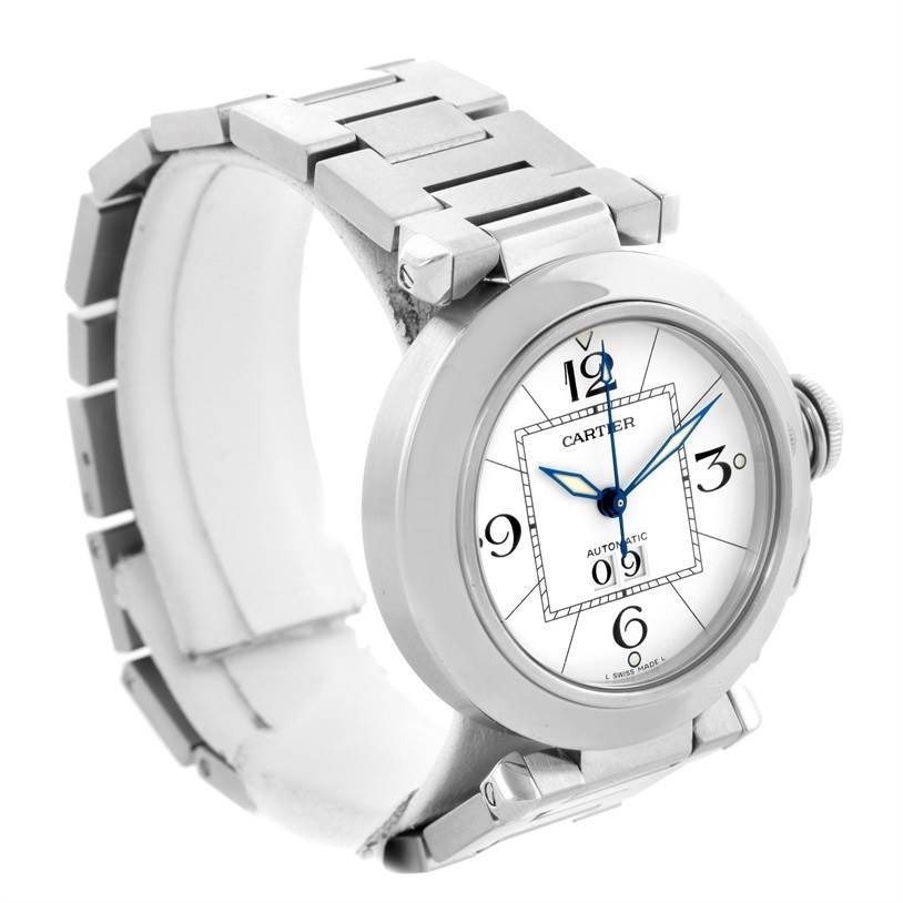 The image shows a Cartier Pasha W31055M7 Men's Stainless Steel White Dial W31055M7 Men's Stainless Steel White Dial watch at an angled side view, featuring the face, crown, and part of the bracelet.