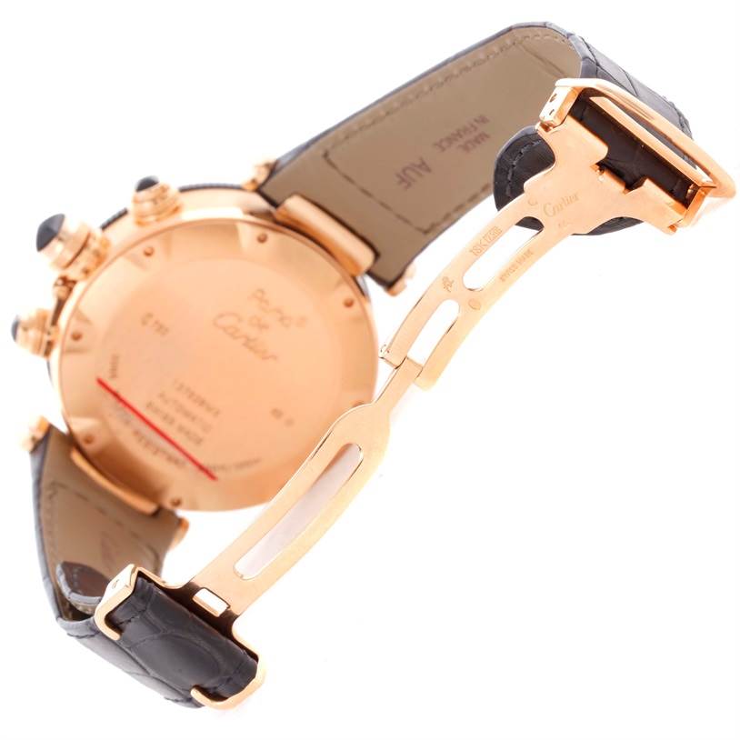 The image shows the back case and clasp of a Cartier Pasha W3030018 Men's Rose Gold Black Dial W3030018 Men's Rose Gold Black Dial watch at an angle displaying the attached leather strap.