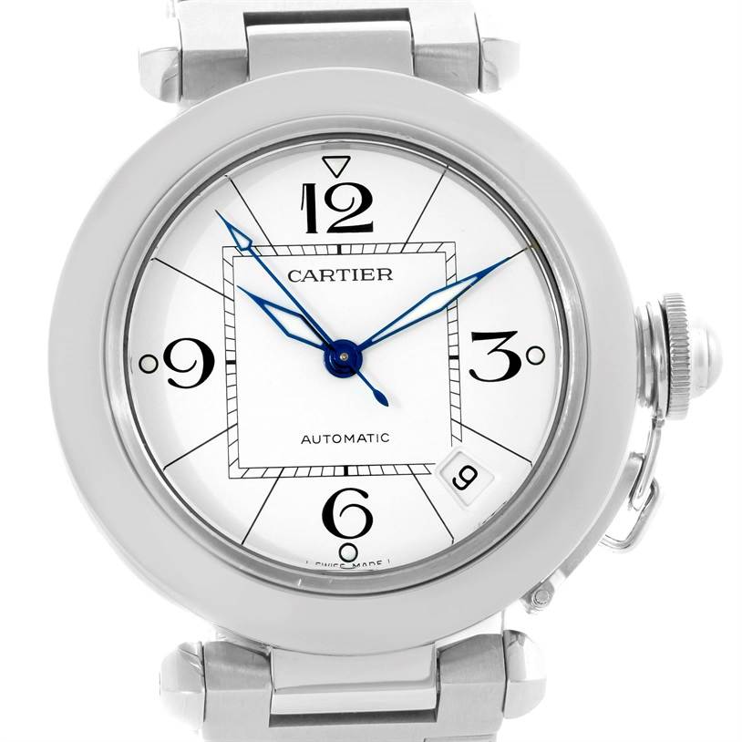 The image shows a front view of a Cartier Pasha W31074M7 Men's Stainless Steel White Dial W31074M7 Men's Stainless Steel White Dial watch, displaying its dial with blue hands and distinctive numerals.