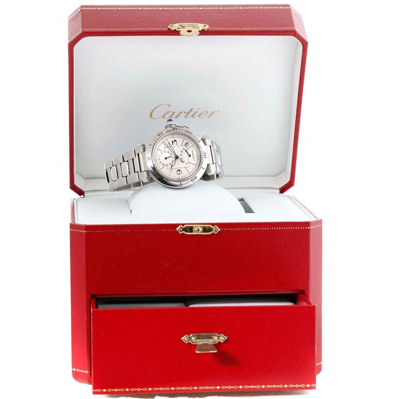 The Cartier Pasha W31037H3 Men's Stainless Steel Silver Dial W31037H3 Men's Stainless Steel Silver Dial watch is displayed front-facing in an open red Cartier watch box with a drawer below.