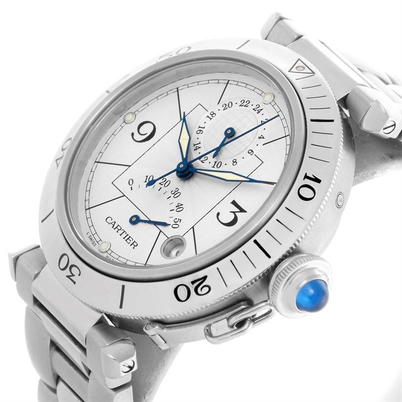 The image shows a close-up angle of the Cartier Pasha W31037H3 Men's Stainless Steel Silver Dial W31037H3 Men's Stainless Steel Silver Dial watch, highlighting the face, bezel, and crown with a blue cabochon.