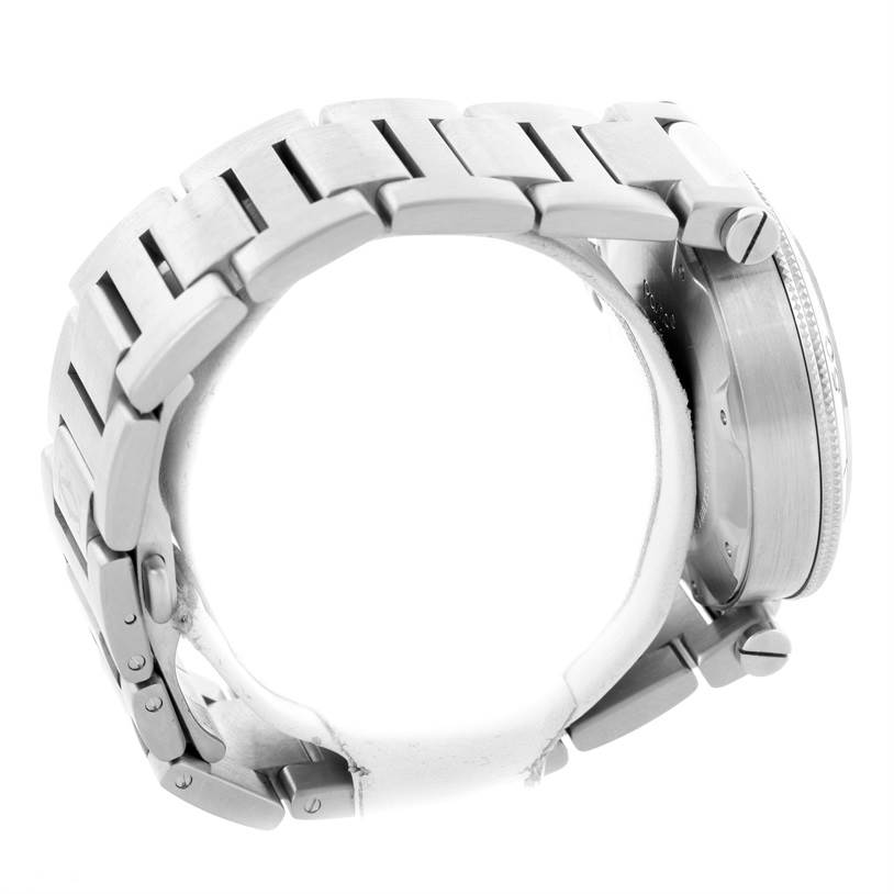 The image shows a side view of the Cartier Pasha W31077M7 Men
s Stainless Steel Black Dial W31077M7 Men
s Stainless Steel Black Dial watch, highlighting its metal bracelet and crown.