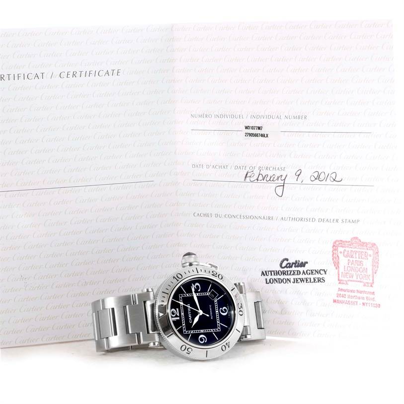 The image shows a Cartier Pasha W31077M7 Men
s Stainless Steel Black Dial W31077M7 Men
s Stainless Steel Black Dial watch placed in front of its certificate of Best Quality
ity and purchase details.