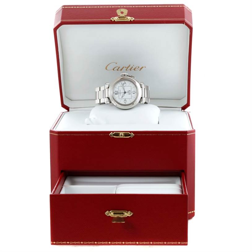 The Cartier Pasha W31055M7 Men
s Stainless Steel White Dial W31055M7 Men
s Stainless Steel White Dial watch is displayed in its open red box, showing the front face and bracelet.