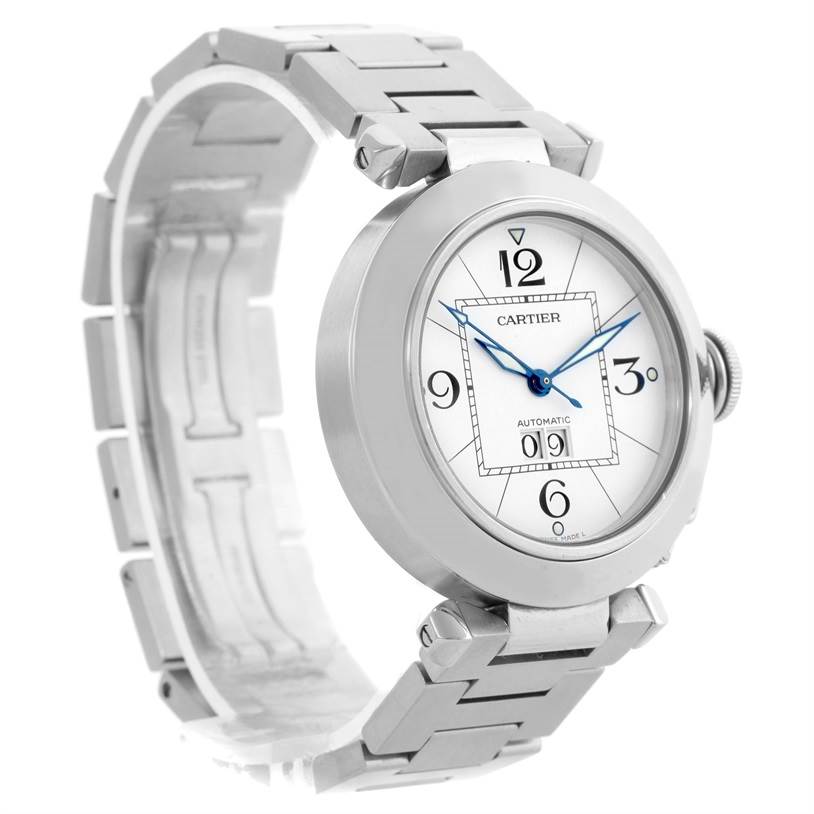 The image shows a Cartier Pasha W31055M7 Men
s Stainless Steel White Dial W31055M7 Men
s Stainless Steel White Dial watch at a three-quarter angle, highlighting its round face, blue hands, and metal bracelet.
