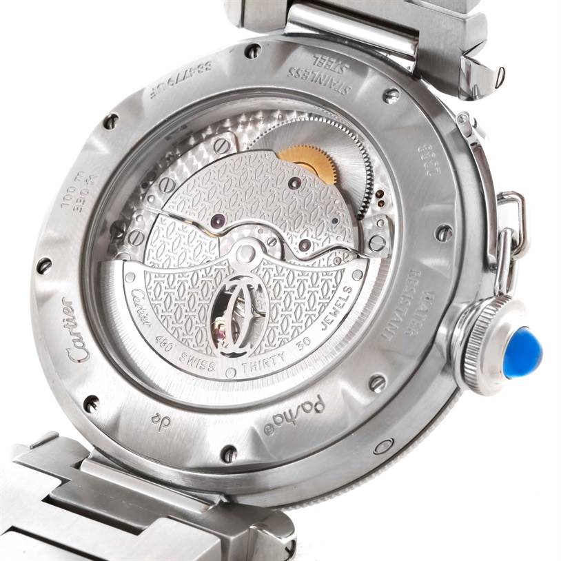This image shows the back view of the Cartier Pasha W31037H3 Men's Stainless Steel Silver Dial W31037H3 Men's Stainless Steel Silver Dial watch, highlighting its internal mechanism and "Cartier" engravings.