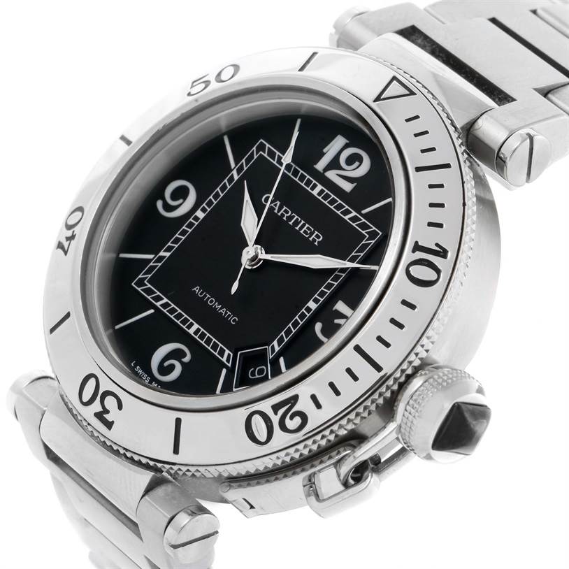 The image shows a close-up angle of a Cartier Pasha W31077M7 Men's Stainless Steel Black Dial W31077M7 Men's Stainless Steel Black Dial watch, highlighting its bezel, dial, crown, lugs, and part of the bracelet.