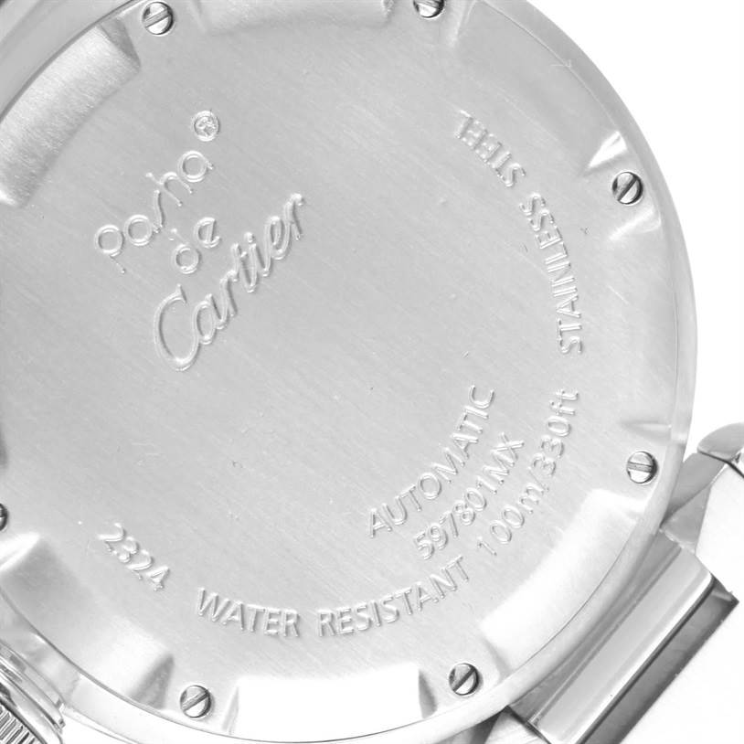 This image shows the back cover of a Cartier Pasha W31074M7 Women's Stainless Steel White Dial W31074M7 Women's Stainless Steel White Dial watch, featuring engraved details and screws.
