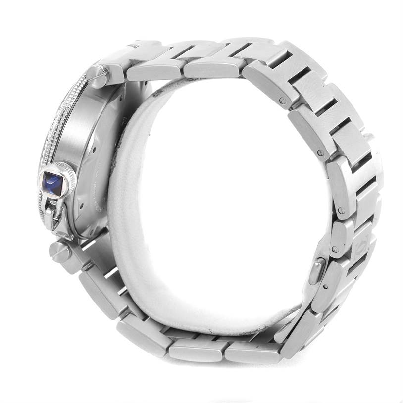 The image shows the side view of a Cartier Pasha W31080M7 Men
s Stainless Steel Silver Dial W31080M7 Men
s Stainless Steel Silver Dial watch, highlighting the band, crown, and case.