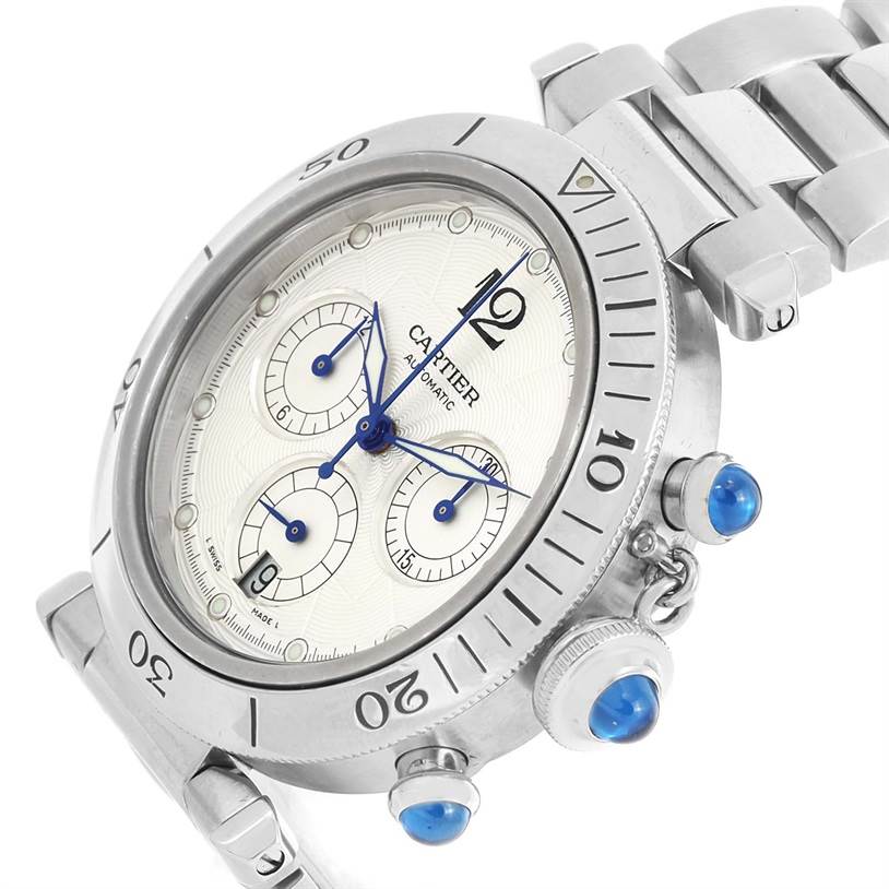 The image shows a close-up angled view of a Cartier Pasha W31030H3 Men's Silver Dial W31030H3 Men's Silver Dial watch, featuring its face, bezel, crown, and part of its bracelet.