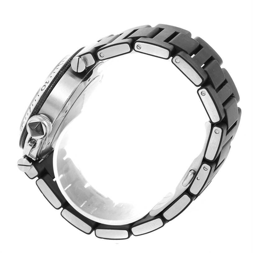 The image shows the side view of a Cartier Pasha W31077U2 Men's Stainless Steel Black Dial W31077U2 Men's Stainless Steel Black Dial watch, displaying its crown, case, and metal bracelet.