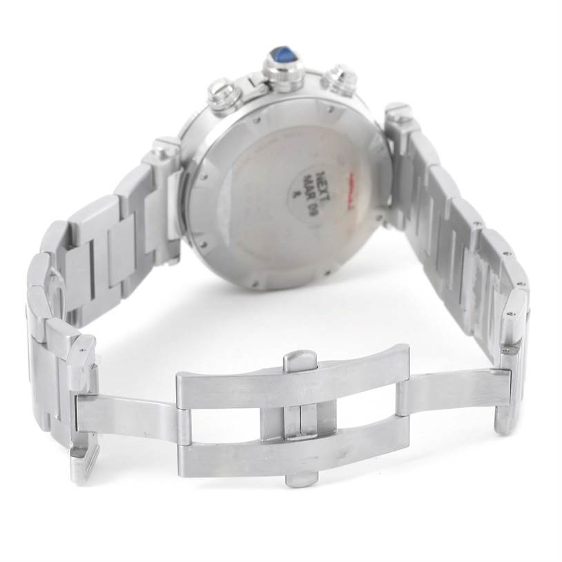 The image shows the back of a Cartier Pasha W31089M7 Men
s Stainless Steel Silver Dial W31089M7 Men
s Stainless Steel Silver Dial model watch, highlighting the open clasp and metallic strap.