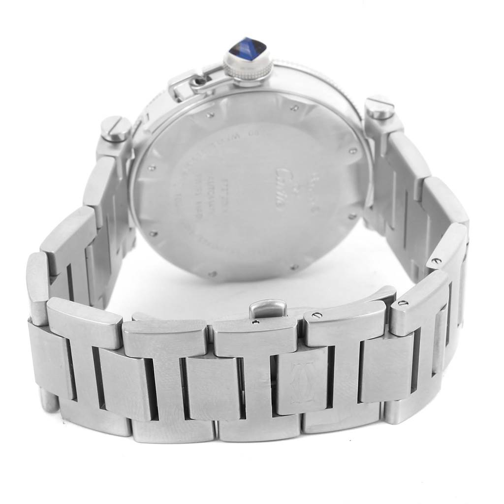 The image shows the back of the Cartier Pasha W31080M7 Men
s Stainless Steel Silver Dial W31080M7 Men
s Stainless Steel Silver Dial watch, including its case back, crown with a blue gem, and part of the metal bracelet.