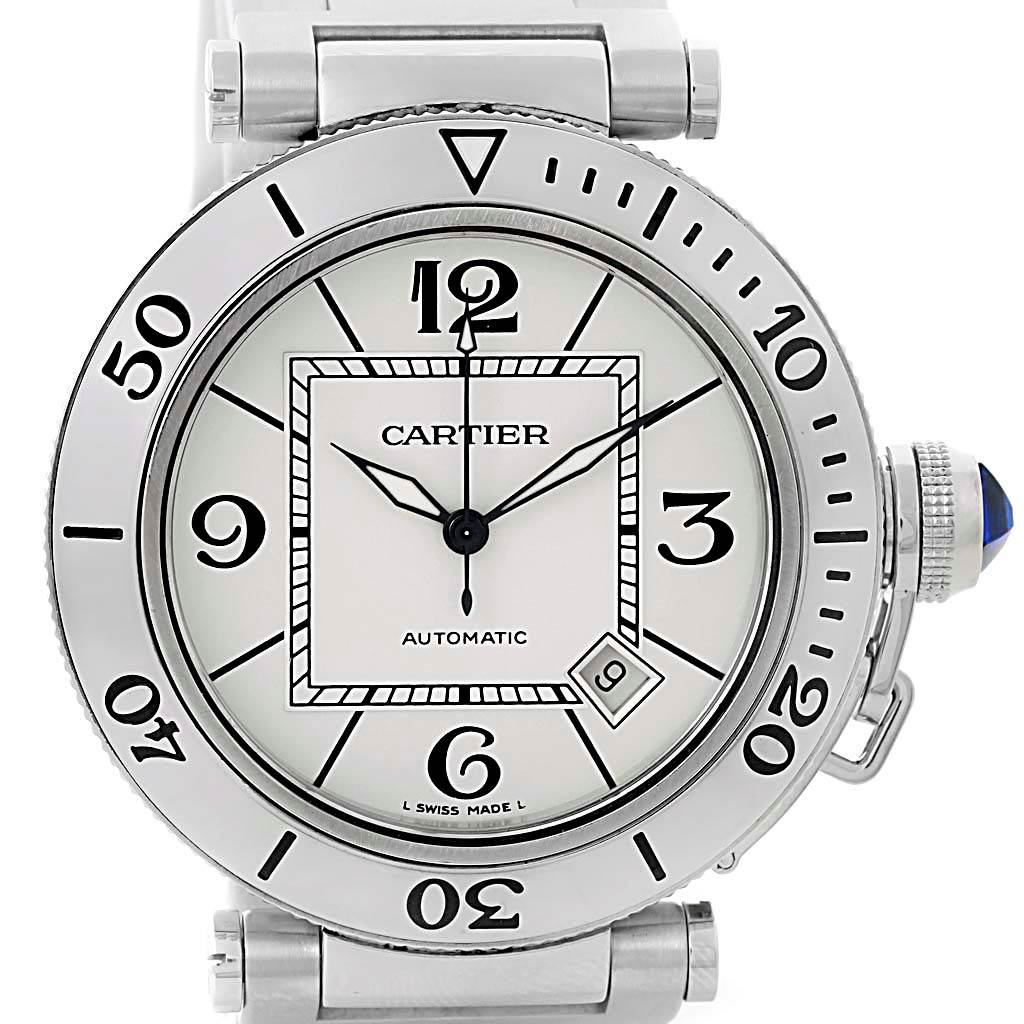 The image shows a Cartier Pasha W31080M7 Men
s Stainless Steel Silver Dial W31080M7 Men
s Stainless Steel Silver Dial model watch from a frontal angle, highlighting its dial, bezel, and part of its band.