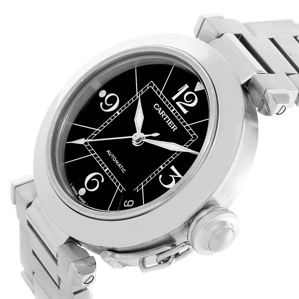 The image shows a close-up side angle of a Cartier Pasha W31076M7 Stainless Steel Black Dial W31076M7 Stainless Steel Black Dial watch, highlighting its face, crown, and part of the bracelet.