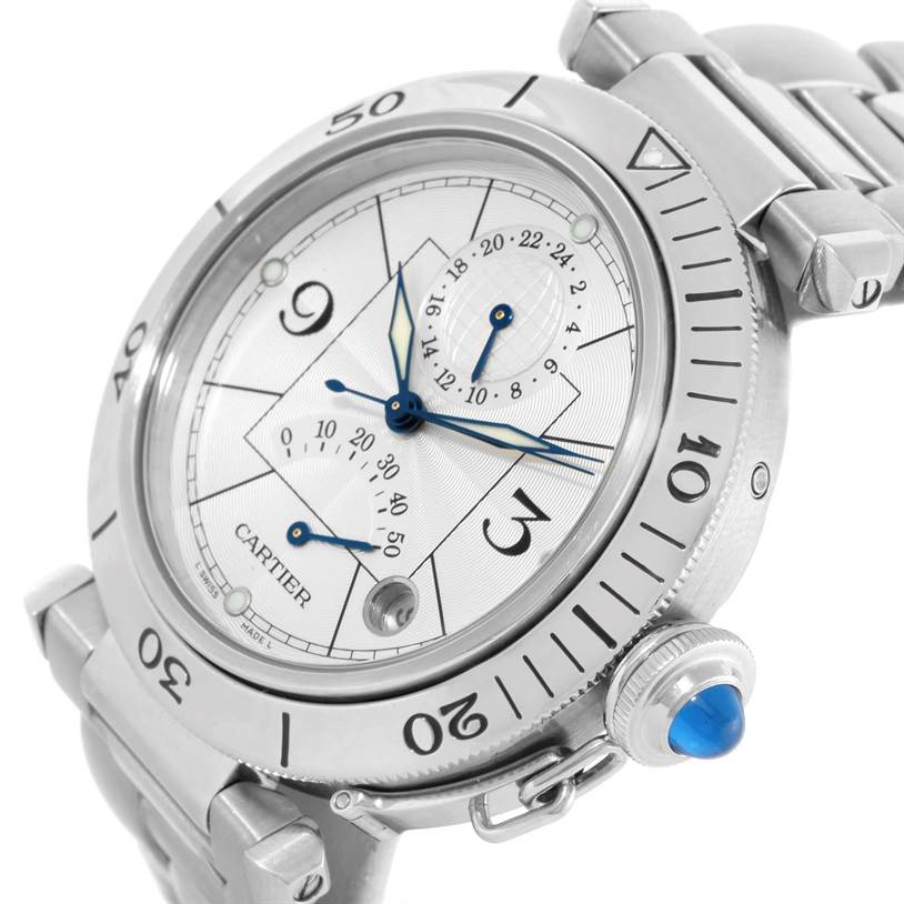 The Cartier Pasha W31037H3 Men's Stainless Steel Silver Dial W31037H3 Men's Stainless Steel Silver Dial watch is shown at an angle displaying the bezel, dial, and crown with a blue cabochon.