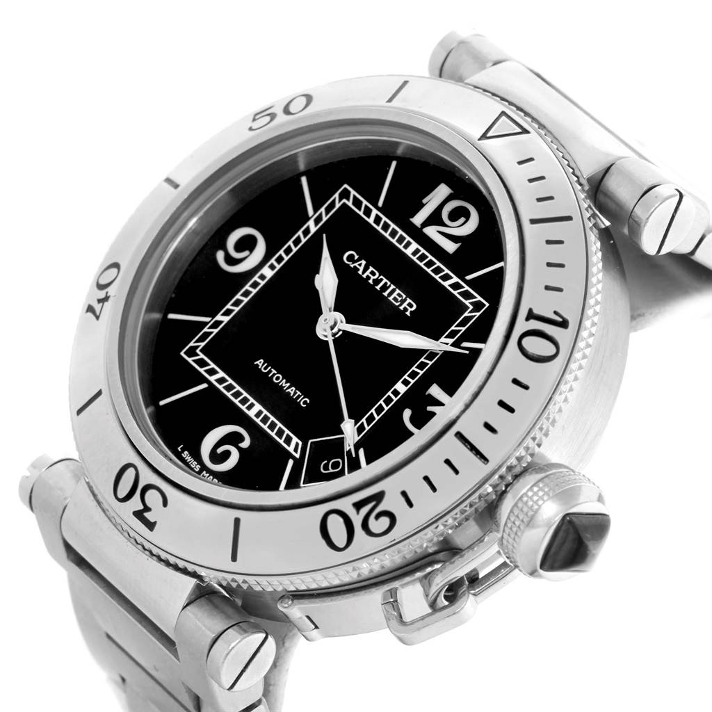 The image shows a Cartier Pasha W31077M7 Men's Stainless Steel Black Dial W31077M7 Men's Stainless Steel Black Dial watch at an oblique angle, highlighting the bezel, dial, crown, and part of the bracelet.