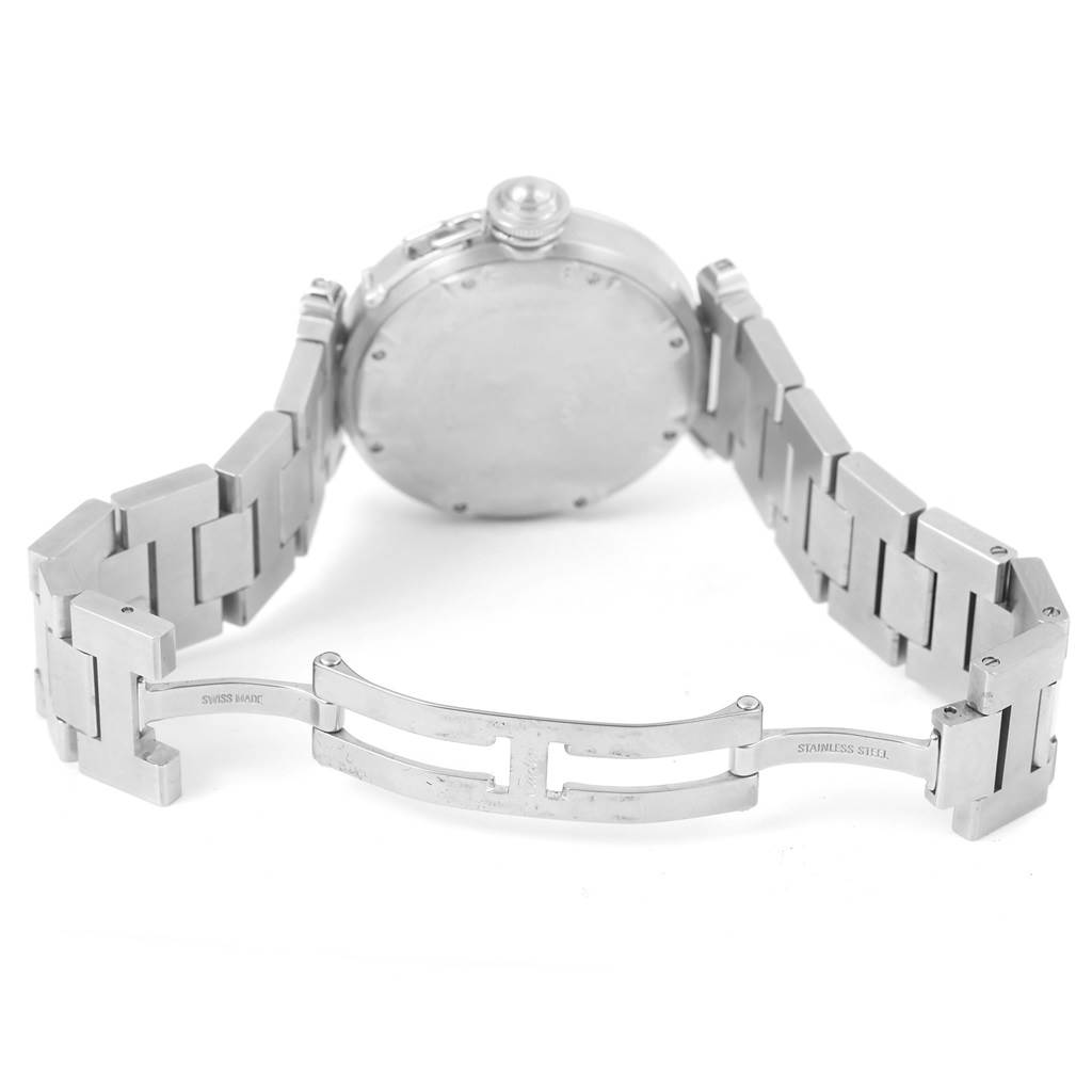 The image shows the back view and clasp of a Cartier Pasha W31074M7 Stainless Steel White Dial W31074M7 Stainless Steel White Dial watch, displaying its stainless steel bracelet and deployment clasp.