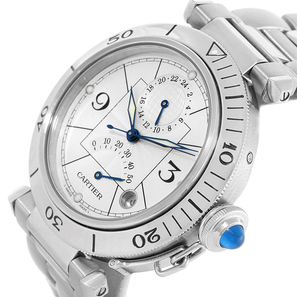 The image shows a close-up angled view of a Cartier Pasha W31037H3 Men's Stainless Steel Silver Dial W31037H3 Men's Stainless Steel Silver Dial model watch face, bezel, and part of the metal strap.