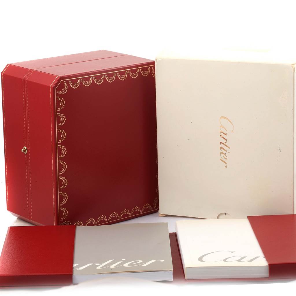 The image shows the Cartier Pasha W31037H3 Men's Stainless Steel Silver Dial W31037H3 Men's Stainless Steel Silver Dial watch packaging, including the red and white boxes and accompanying manuals.